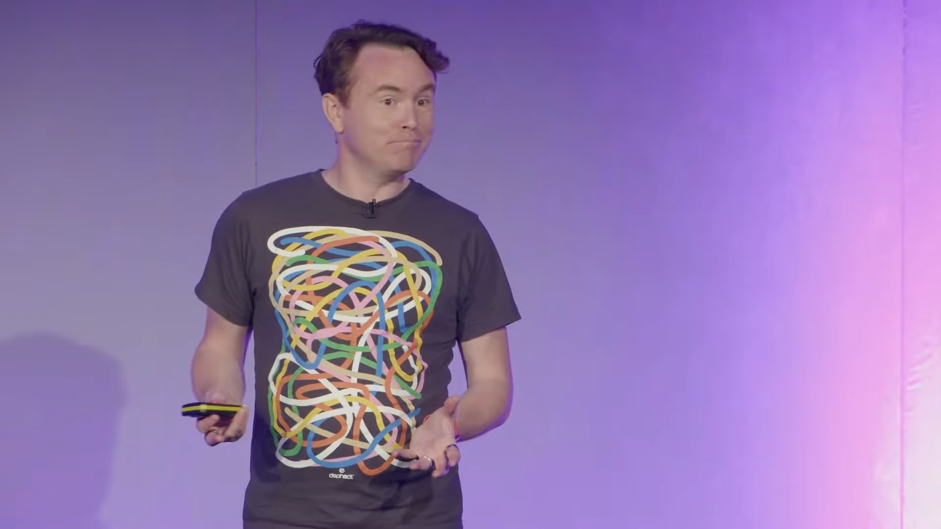 Stef Lewandowski on stage at Coalesce London, October 2022